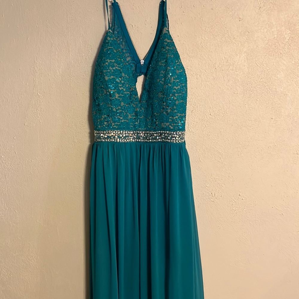Large turquoise prom dress